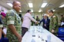 Menhan Sjafrie Sjamsoeddin berjabat tangan dengan delegasi Jepang di atas kapal JS Kunisaki